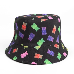 Black canvas bucket hat for women with colorful gummy bear prints and wide sun brim