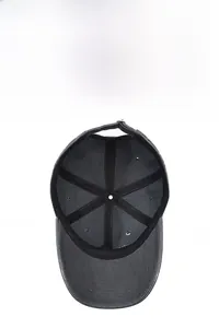 Detail of gray baseball cap interior showing breathable mesh and adjustable metal buckle