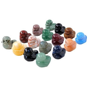 Various natural crystal duck carvings in multi-colored semi-precious polished gemstones