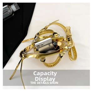 Internal view of the gold mirror square handbag showing capacity for phone and makeup