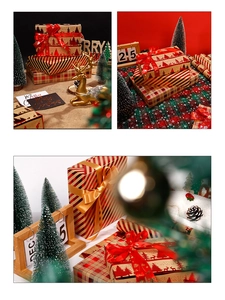 Detail of Christmas kraft wrapping paper set with red ribbons and festive patterns