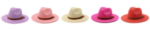 Detail view of five assorted colorful wide-brim straw hats with leather decorative bands