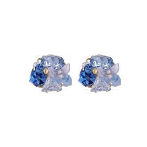 18k gold plated butterfly flower earrings with blue crystals and pearls on white backdrop