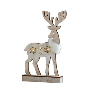 Christmas wooden reindeer ornament with LED lights and white fur collar on tabletop