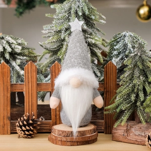 Grey Christmas gnome plush with star hat on wooden base, festive home decoration