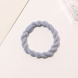 Detailed macro view of a lavender woven elastic hair tie with a matching oval resin clasp