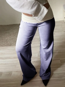Vertical striped wide-leg trousers for women with elastic waist and relaxed holiday style
