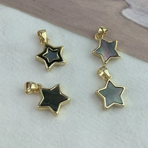 Quatre pendentifs étoiles en nacre noire avec bordure dorée pour bijoux DIY