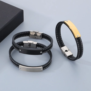 Men's leather bracelet with stainless steel metal plates in gold, silver, and black finishes