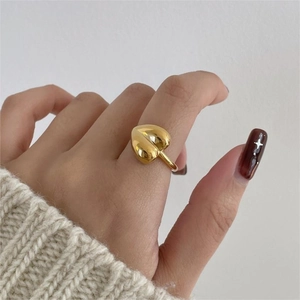 Polished gold heart ring for women minimalist 925 silver jewelry on model