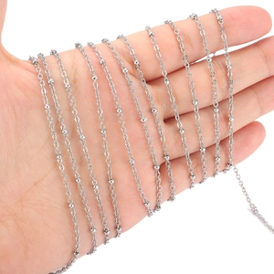 Polished silver stainless steel bead chain for DIY jewelry making shown in hand