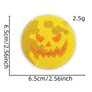 Detailed view of pumpkin embroidery patch showing 6.5cm diameter and 2.5g weight info