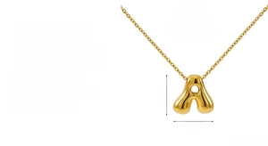 Macro detail of bubble letter A pendant in 18k gold plated titanium steel with size markings