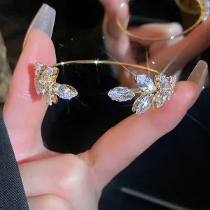 Elegant gold leaf open bracelet with sparkling marquise-cut zircons for women