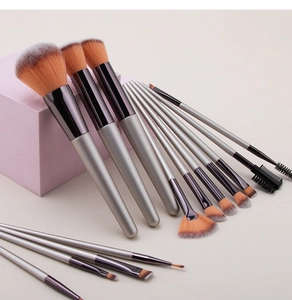 33-piece makeup brush set featuring champagne gold handles and soft synthetic bristles