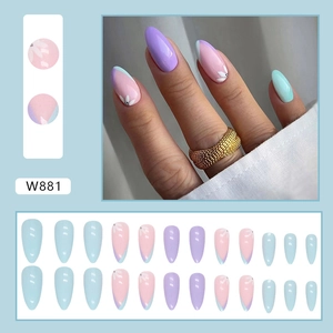 Almond shaped press-on nails with pastel floral patterns in purple and blue tones