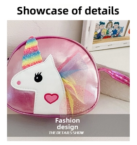 Close-up of pink unicorn crossbody bag featuring rainbow horn and sequin details