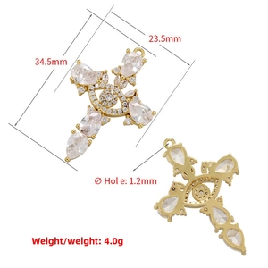 Detail of 34.5x23.5mm gold-plated cross pendant with evil eye and white zircon stones