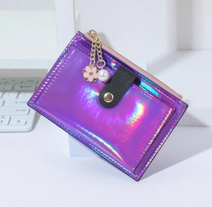 Holographic purple card holder with zipper closure and floral pearl charms detail