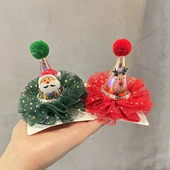 Detail of Christmas mini hat hair accessories with Santa and reindeer cartoon patterns