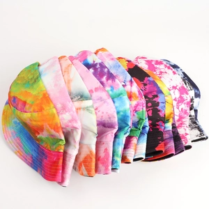 Detailed side view showing multiple colorful tie-dye bucket hats with decorative stitching
