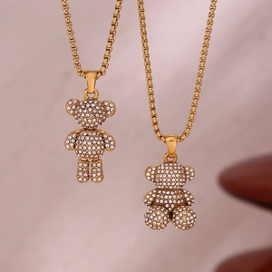 Gold-plated bear pendants with full crystal pavé on a square pearl chain necklace