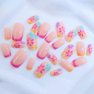 French tip press-on nails with colorful floral patterns and a glossy finish set of 24