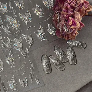 Holographic silver butterfly nail stickers with artistic floral background layout