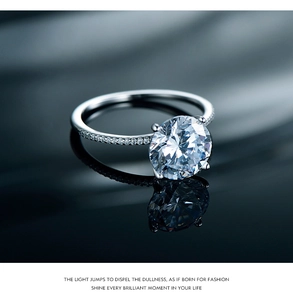 Macro detail of luxury S925 silver ring featuring a floating round cut zircon inlay