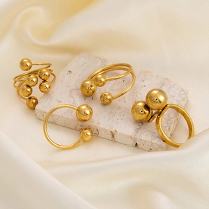 Vintage 18K gold plated stainless steel spherical ring set on light stone tray