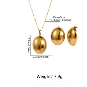 Detailed view of gold oval pendant necklace set with dimensional measurements and specs