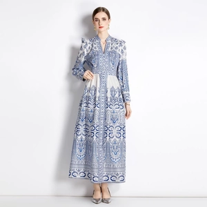 Vintage palace style V-neck maxi dress with blue paisley print and lantern sleeves