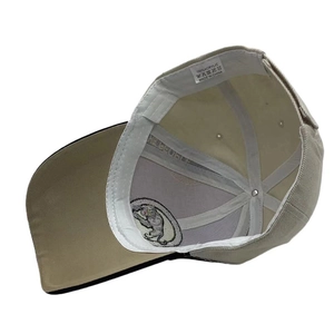 Internal view of beige baseball cap showing sweatband and 100% acrylic material tag