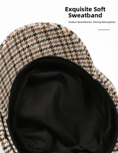 Detail of soft cotton inner sweatband with houndstooth fabric lining on vintage cap