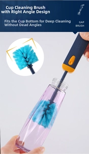 Deep cleaning brush detail showing long handle and blue fiber head inside glass bottle