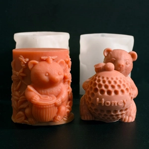 Macro detail of silicone mold showing embossed honey bear and bee relief for DIY crafts
