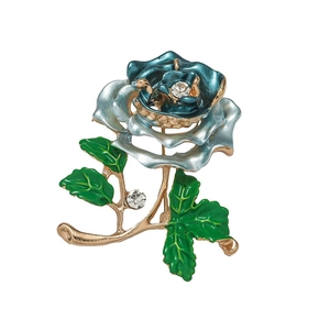 Elegant gold-tone rose brooch with blue-green enamel petals and sparkling crystal accents