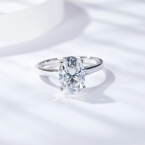 Classic 2.5 carat oval cut moissanite ring with silver band in a four-prong setting