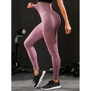 Detailed view of high-waist seamless yoga pants with laser-cut breathability holes