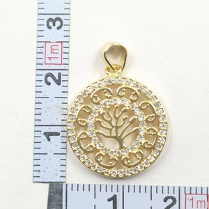 Detailed view of a gold Tree of Life pendant with cubic zirconia stones showing 2.5cm size