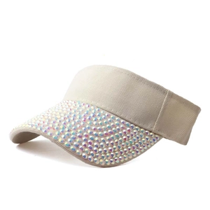 Detailed view of colorful AB rhinestones on the brim of a beige sun visor hat