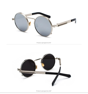 Detail of silver steampunk sunglasses featuring metal spring temples and round black lenses