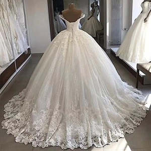 Elegant off-shoulder lace ball gown wedding dress with a long train and V-back ribbon ties