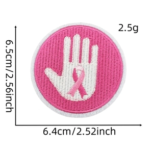 Detail showing 6.4x6.5cm pink ribbon embroidered patch with dimensions and weight