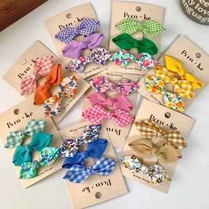 Set of three cute floral bow hair clips for girls in colorful Korean design patterns