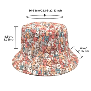 Reversible bucket hat with cartoon cat and dog prints, featuring 56-58cm head circumference