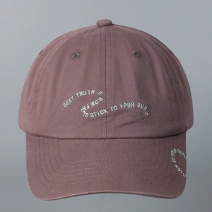 Detailed embroidery text on a vintage brown cotton baseball cap for men and women