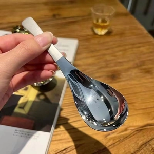 Minimalist stainless steel Korean round spoon with polished head and matte handle finish