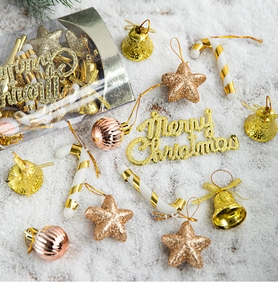 Christmas tree ornaments set featuring gold bells, frosted stars, and candy canes on snow