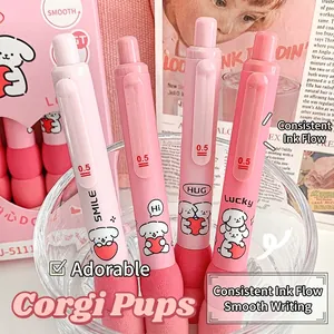Macro shot of four pink retractable 0.5mm gel pens with dog illustrations and soft grip